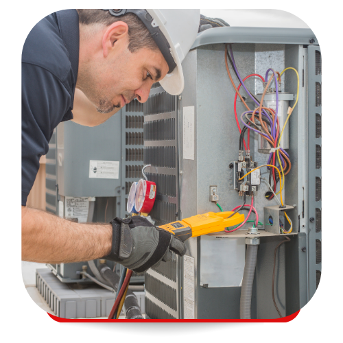 HVAC tech servicing air conditioning unit